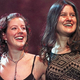 Singers Sarah McLachlan (left) and Paula Cole celebrate the history-making egg-release.